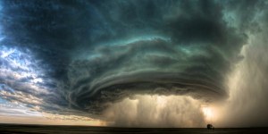 Supercell thunderstorm rolls accross the Montana prairie at sunset.