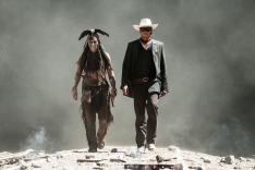 This undated publicity photo released by Disney and Jerry Bruckheimer, Inc. shows Johnny Depp, left, as Tonto, and Armie Hammer, as The Lone Ranger, in a scene from the film, "The Lone Ranger." The movie releases July 3, 2013. (AP Photo/Disney/Jerry Bruckheimer, Inc., Peter Mountain, File)